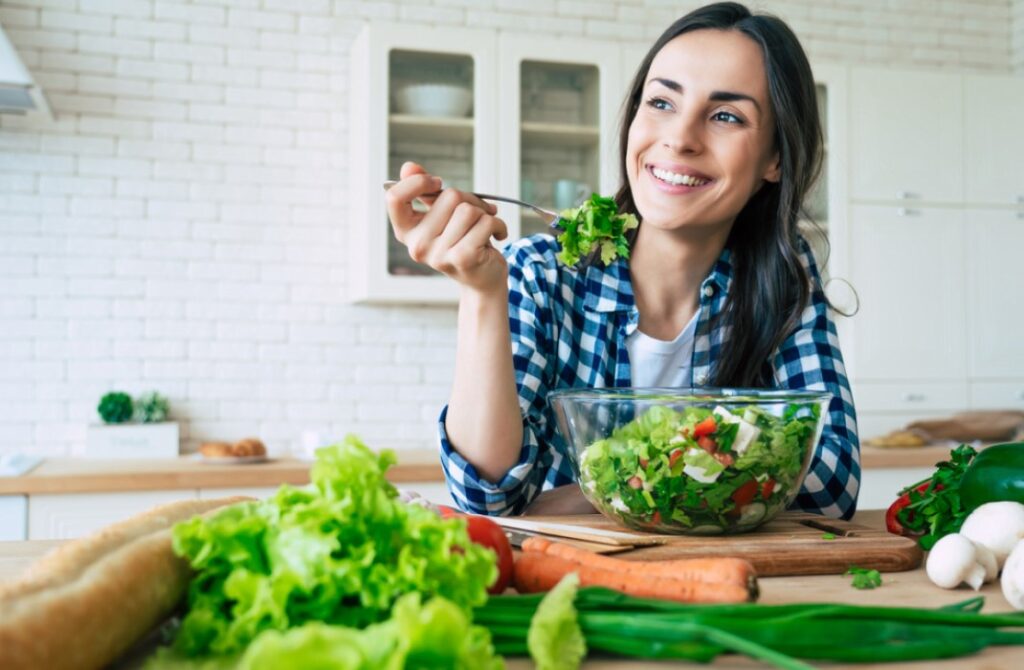 woman eating a nutrient rich salad